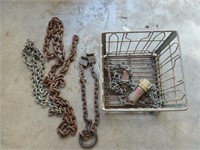 Assorted sizes and lengths of chain in metal crate