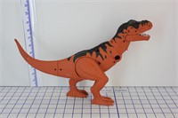 DINOSAUR TOY (MISSING AN ARM)