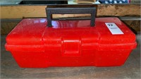 Red plastic tool box with Black & Decker pivot