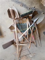Tools - pick, axe, shovels, broom, rake, post