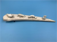 3 Ivory walruses on a walrus Ivory tusk by Moses P