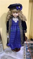 Large standing porcelain head Doll with nice
