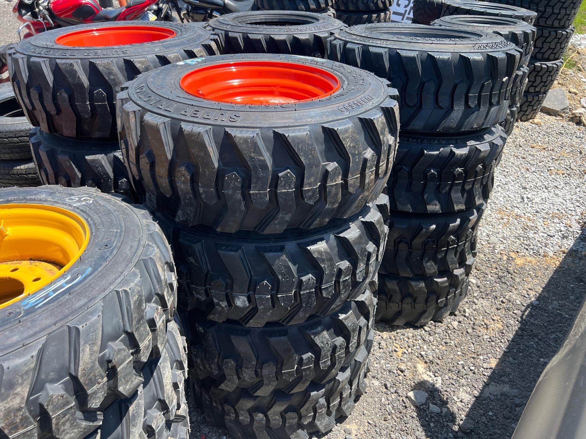 (4) 12-16.5 Skid Steer Tires On Orange Wheels