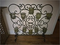 Iron candle holder with insulators