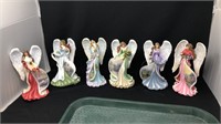 Tray full of 6 Thomas Kinkade angels