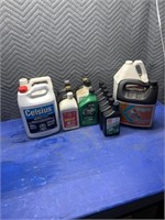 6 - 500 mL of two cycle engine oil ,  3 L of