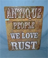 Antique people we love rust style advertising sign