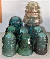 Lot #4349 - (9) antique glass insulators most