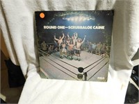 Scrubbaloe Caine-Round One