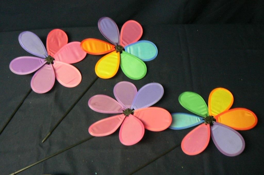 SET OF FOUR  WIND SPINNERS