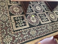 AREA RUG 95INX130IN NEEDS CLEANED