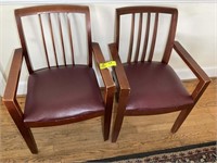 PAIR OF WOODEN ARM CHAIRS WITH VINYL SEATS. NEED R