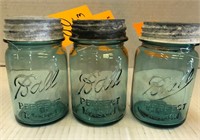 three pint size blue ball jars with zinc lids