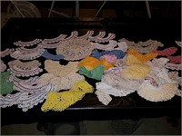 Hand crocheted doilies dozens and dozens in