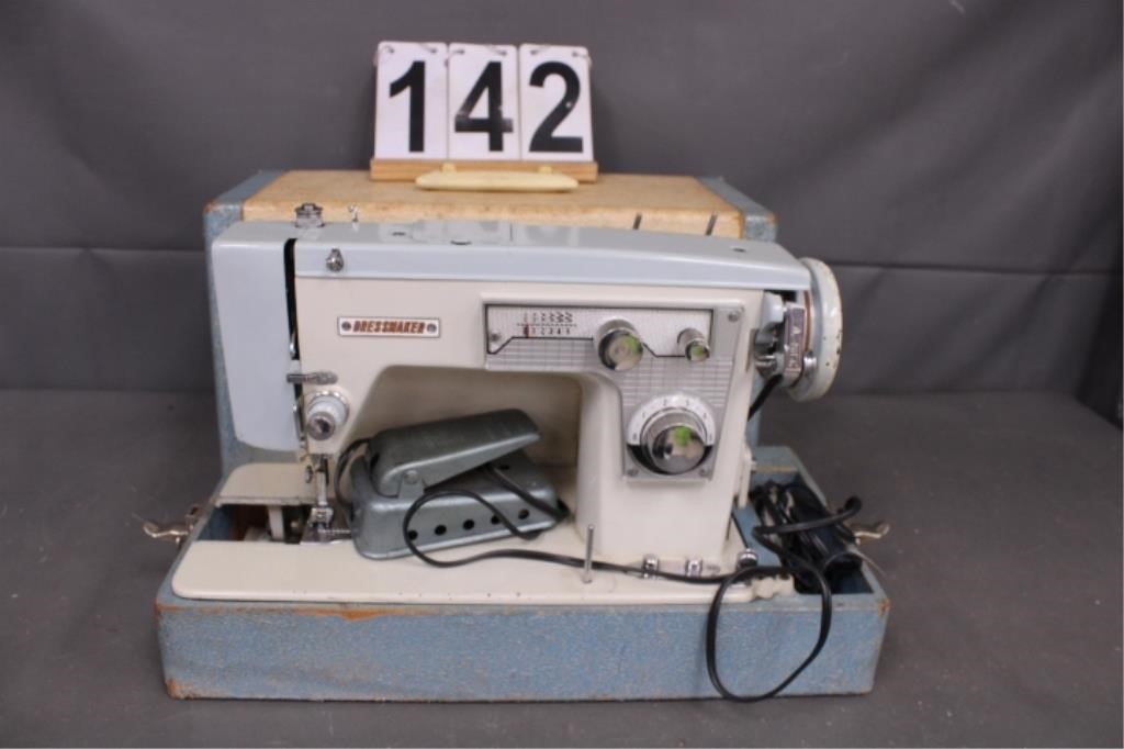 Deluxe Dressmaker Sewing Machine (Powers On) -
