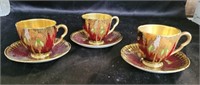 Carlton Ware teacups and saucers. 3 sets