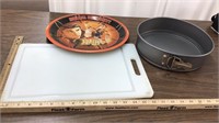 Misc. cutting board, cake pan, IU metal platter