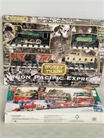 2 plastic train sets in original boxes