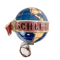 Vintage Schlitz Illuminated Globe Advertisement