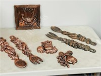 copper colored vintage molded wall ornaments