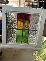 Stained glass window with hooks and chain for