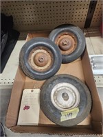 pair of 12" x 2.75 sold tires on wheels