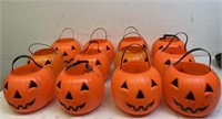 12 plastic  jack-o’-lantern buckets