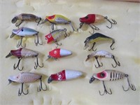 (12) WOOD FISHING LURES, HEDDONS, ETC