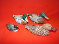 Qty of wooden ducks , 1 plastic duck
