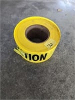 Partial Roll of "Caution" Tape