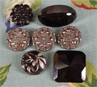 Seven Black Glass Faceted And Silver Lustre Button