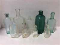 9 Vintage Medicine Bottles - 3 are blue tint