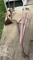 Antique garden plow, with a large blade plow,