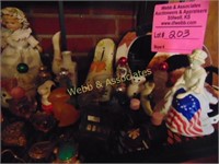 Second shelf of figurines, décor, and Avon bottles