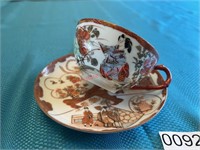 Asian Tea Cup and Saucer (Upstairs Living Room)