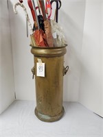 Copper umbrella stand with umbrellas