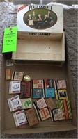 Old matchbooks, cigar box