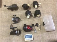 Assortment of fishing reels.