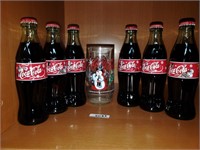 Set of Coca Cola collector bottles & glass (7)