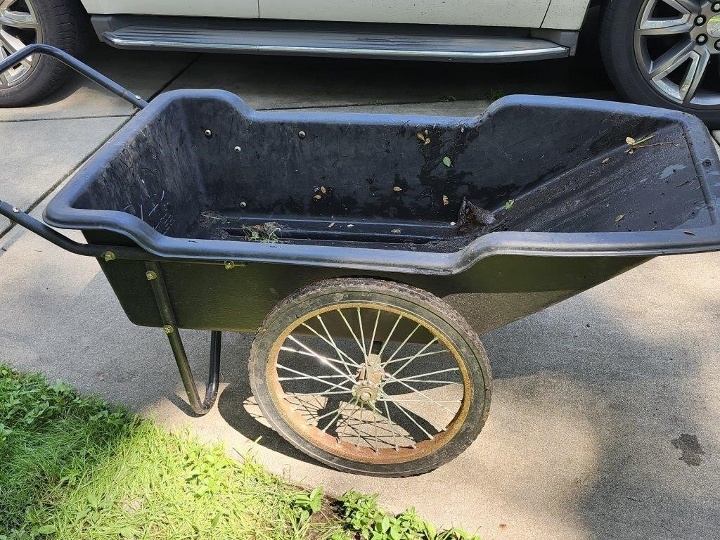 Pollar Trailer Yard cart trailer w/ big tires.