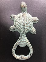 Adorable cast iron turtle shaped bottle opener. It