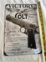 Colt pistol, 12 inch metal sign