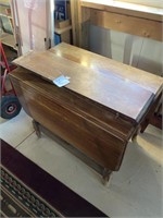 DROP LEAF TABLE W/3 LEAVES- NEEDS REFINISHED