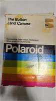 Polaroid SX-70 the button land camera