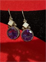 Two pair of sterling silver pierced earrings. One