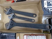 Adjustable wrenches