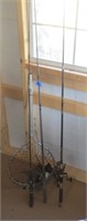 3 fishing poles with reel and net