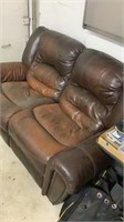 Reclining leather loveseat