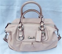 Pale pink Coach purse. Good condition. Includes