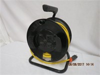 Heavy Duty extension cord on reel stand with 4